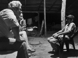 Daniel Schavelzon and Ana Igareta listening to Crspulo Lucero; Photograph by Matas Hernandez.